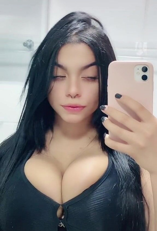 2. Beautiful Karniello Shows Cleavage in Sexy Black Bra