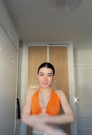 2. Beautiful Kiara Brunett in Sexy Orange Crop Top