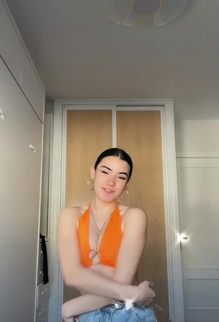 3. Beautiful Kiara Brunett in Sexy Orange Crop Top