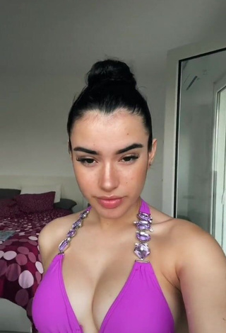 1. Irresistible Kiara Brunett in Violet Bikini Top