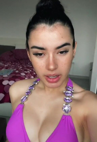 1. Wonderful Kiara Brunett Shows Cleavage in Violet Bikini Top