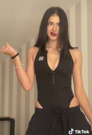 3. Erotic Liza Nice Shows Cleavage in Black Bodysuit