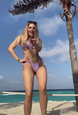 1. Irresistible Lorena Fernández in Purple Bikini at the Beach