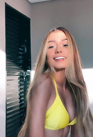 3. Luane Guiné Looks Sweet in Yellow Bikini Top