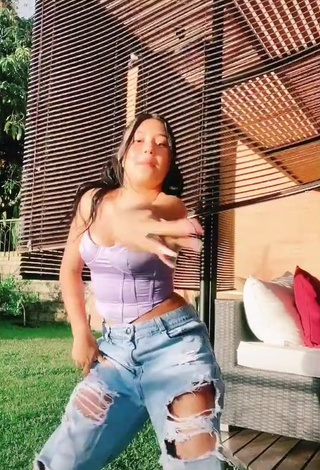 Irresistible Mafe Vásquez Shows Cleavage in Purple Crop Top