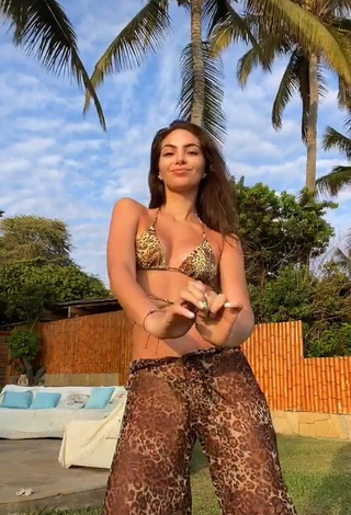 3. Erotic Natalie Vértiz Shows Cleavage in Leopard Bikini Top