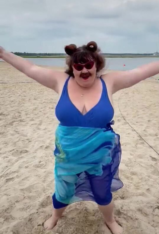 Erotic Netta Barzilai Shows Cleavage at the Beach and Bouncing Boobs