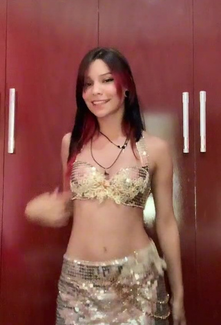 1. Erotic Ni.nique in Golden Crop Top while doing Belly Dance