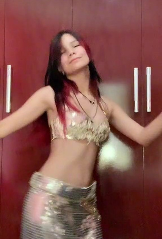 2. Erotic Ni.nique in Golden Crop Top while doing Belly Dance