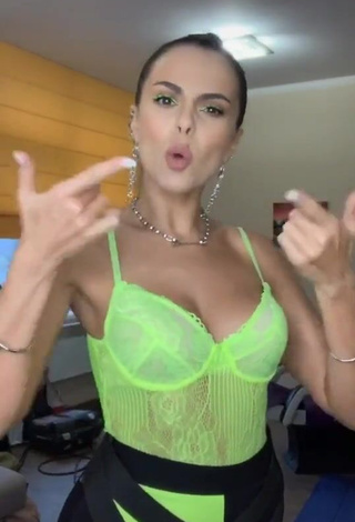 3. Erotic Nastia Kamenskykh Shows Cleavage in Lime Green Bodysuit