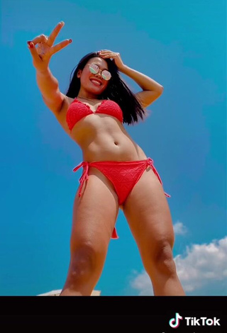 3. Captivating Virgie Ann Casteel in Red Bikini at the Beach