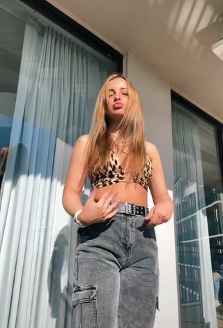 Erotic Mars Shows Cleavage in Leopard Crop Top