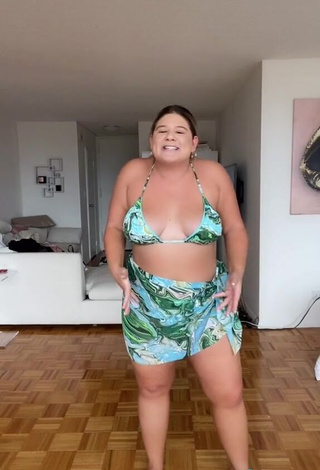 Erotic Remi Jo Shows Cleavage in Floral Bikini Top