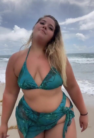 1. Cute Sam Paige Shows Cleavage in Green Bikini at the Beach