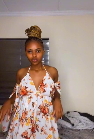 1. Irresistible Sphokuhle.n in Floral Sundress and Bouncing Tits