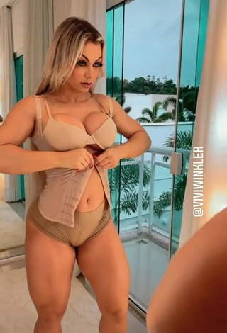 1. Erotic Vivi Winkler Shows Cleavage in Beige Bra