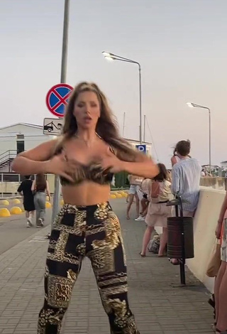 3. Erotic MIRAVI in Bra in a Street