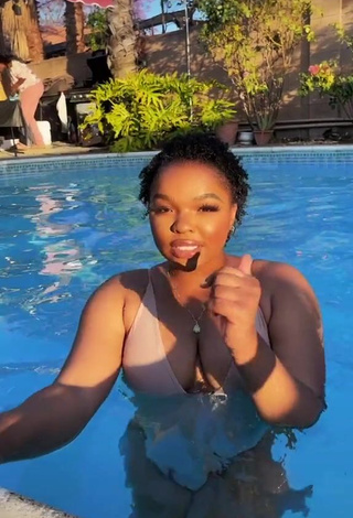 1. Erotic agbodoll7 Shows Cleavage in Swimsuit at the Pool