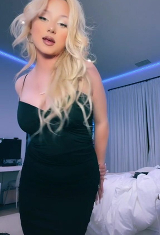 Erotic Alabama Barker Shows Cleavage in Black Dress