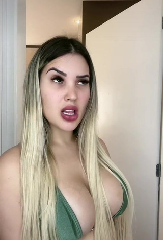 Irresistible Alannis Proença Shows Cleavage in Green Bikini Top