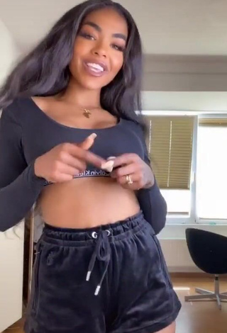 Cute Alicia Awa Shows Cleavage in Black Crop Top