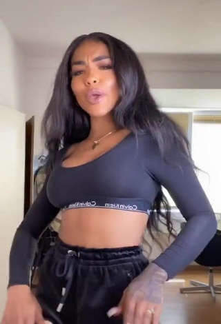 3. Cute Alicia Awa Shows Cleavage in Black Crop Top