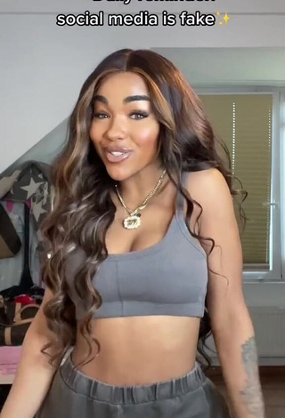 1. Hot Alicia Awa Shows Cleavage in Grey Crop Top