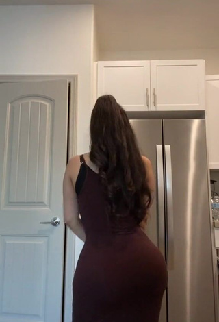 3. Erotic Alondra Ortiz Shows Cleavage in Brown Dress