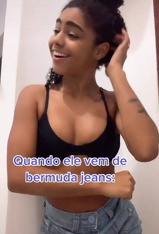 1. Pretty Angel Oficial Shows Cleavage in Black Bra