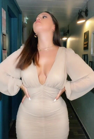 Cute Anissa Shows Cleavage in Dress