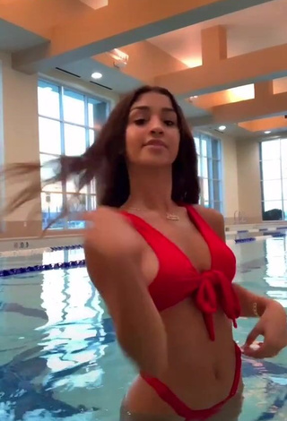 1. Seductive Ava Justin Shows Cleavage in Red Bikini at the Swimming Pool