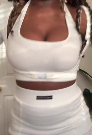 Erotic Chakira Clark Shows Cleavage in Crop Top