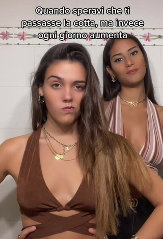 1. Beautiful Clarissa Rotelli Shows Cleavage in Sexy Brown Crop Top