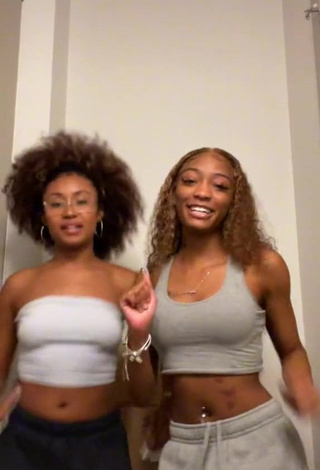 1. Erotic Davine Riley Shows Cleavage in Grey Crop Top