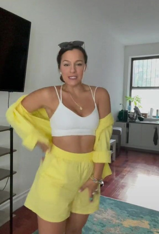 2. Erotic Deanna Giulietti Shows Cleavage in White Crop Top