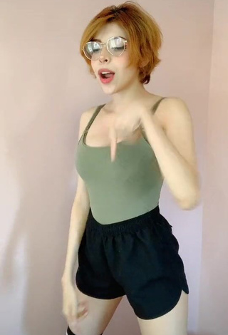 Hot Didi Shows Cleavage in Olive Top