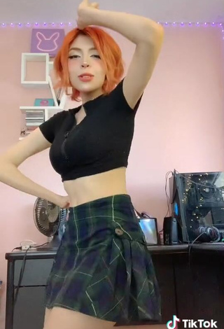 Irresistible Didi Shows Cleavage in Black Crop Top