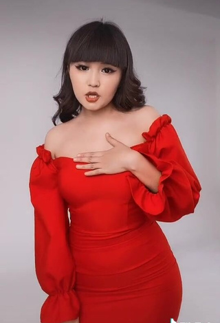 Erotic Asem Nygmetzhan Shows Cleavage in Red Dress