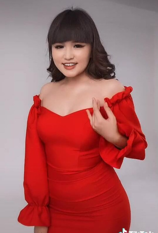 3. Erotic Asem Nygmetzhan Shows Cleavage in Red Dress