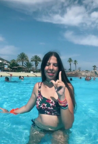 2. Cute Esther Martinez Shows Cleavage in Floral Bikini Top at the Swimming Pool