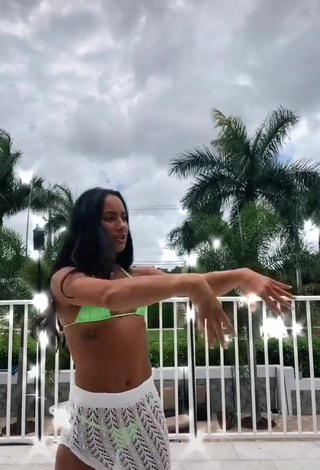 1. Irresistible Gabi Butler Shows Cleavage in Light Green Bikini Top