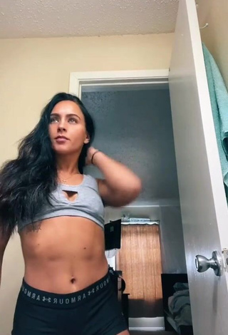 3. Erotic Gabi Butler Shows Cleavage in Grey Sport Bra (Side Boob)