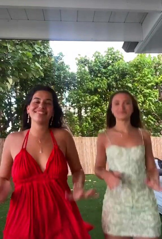 2. Erotic Hannah Meloche Shows Cleavage in Dress