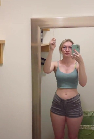 1. Cute Sydney Shows Cleavage in Olive Crop Top