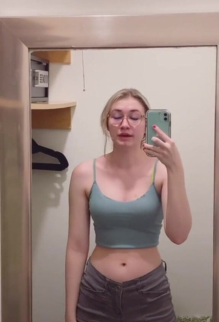 Cute Sydney Shows Cleavage in Olive Crop Top