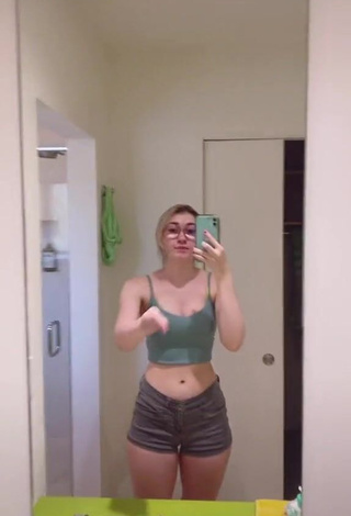 1. Hot Sydney Shows Cleavage in Olive Crop Top