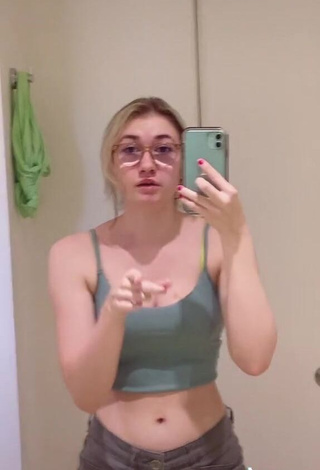 Hot Sydney Shows Cleavage in Olive Crop Top