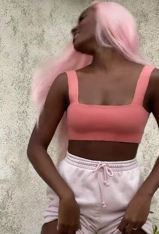 1. Irresistible Mirella Qualha Shows Cleavage in Peach Crop Top