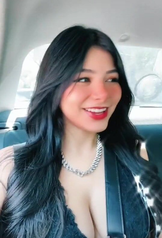 3. Aylin Criss Shows her Appealing Cleavage in a Car