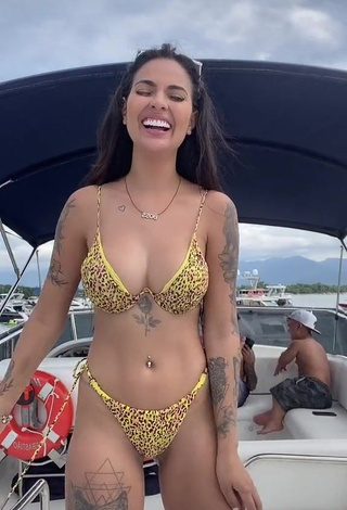 Hottie Pamella Fuego Shows Cleavage in Leopard Bikini on a Boat